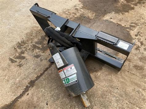 cid x-treme skid steer auger attachment price|cid rock auger.